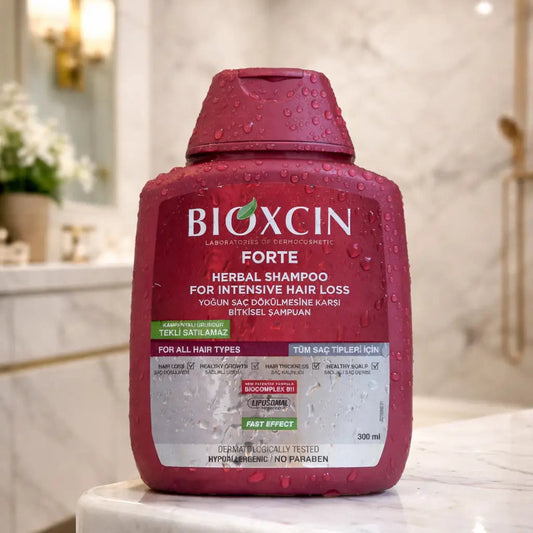 Bioxcin Forte shampoo bottle on a bathroom counter