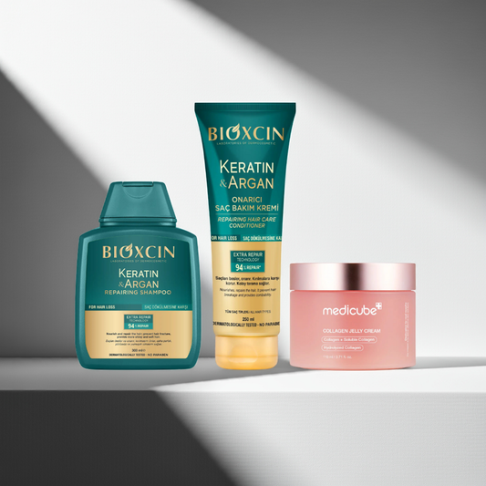 Bioxcin Keratin Argan Repairing Shampoo, Conditioner & Medicube Collagen Jelly Cream on a grey background