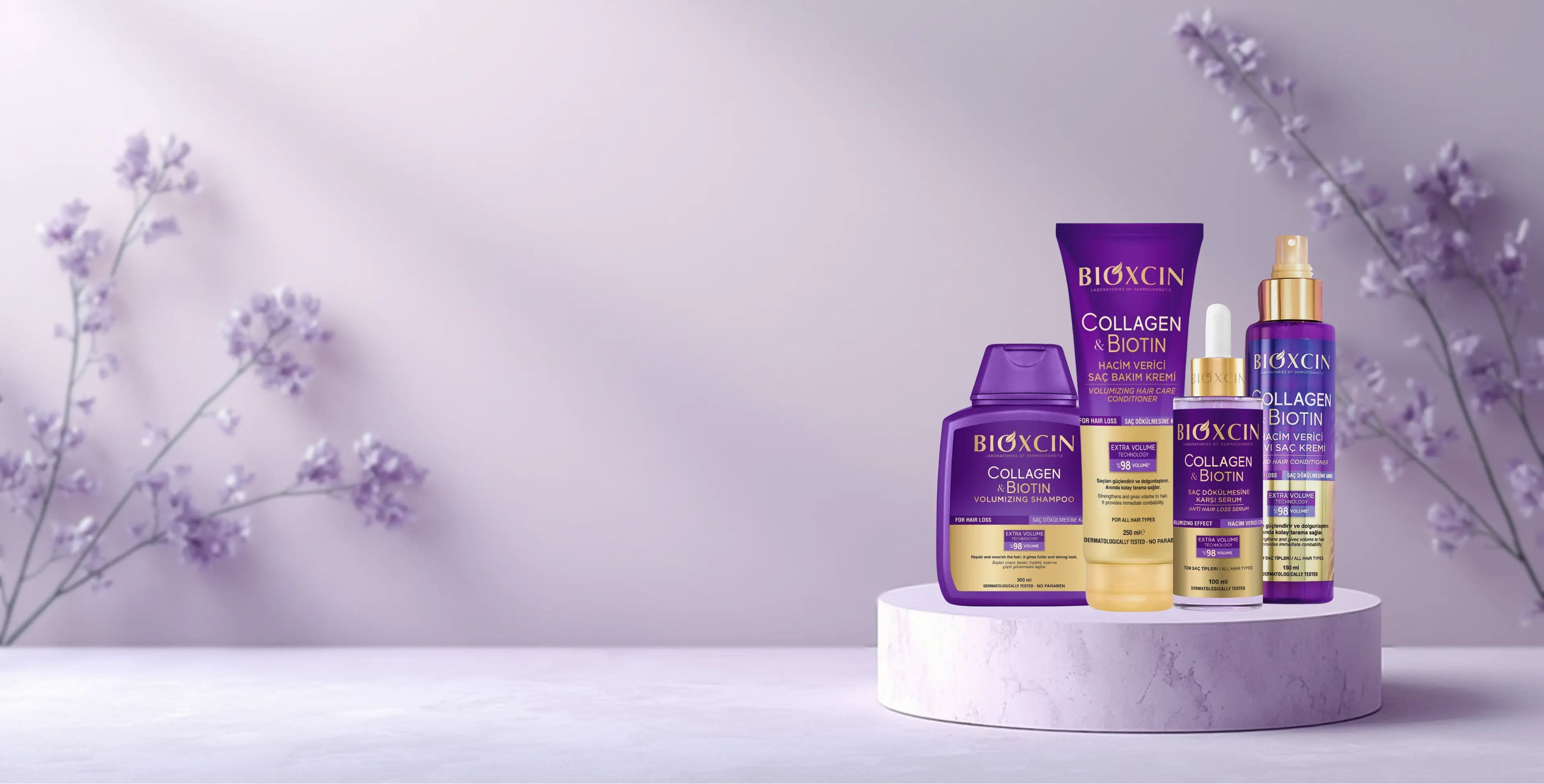 Bioxicin skincare products on a white platform with a light purple background