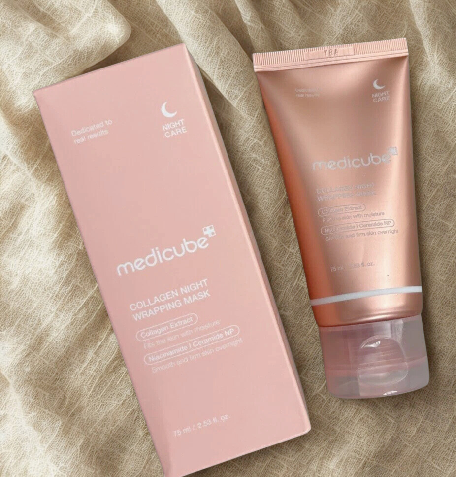 Medicube collagen night wrapping mask packaging and tube on a textured beige background
