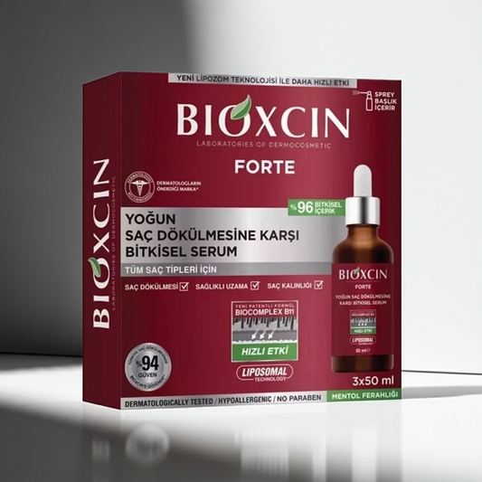 BIOXCIN FORTE hair serum triple pack with text on a grey background